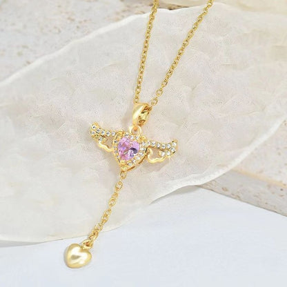 Amorital angel wings necklace with pink heart crystal — gold and silver pendant symbolizing love, luck, purity, and protection
